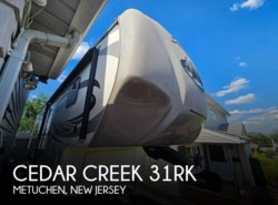 Used 2015 Forest River Cedar Creek 31RK available in Metuchen, New Jersey