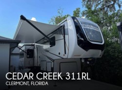 Used 2022 Forest River Cedar Creek 311RL available in Clermont, Florida