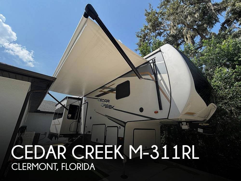 Used 2022 Forest River Cedar Creek M-311RL available in Clermont, Florida