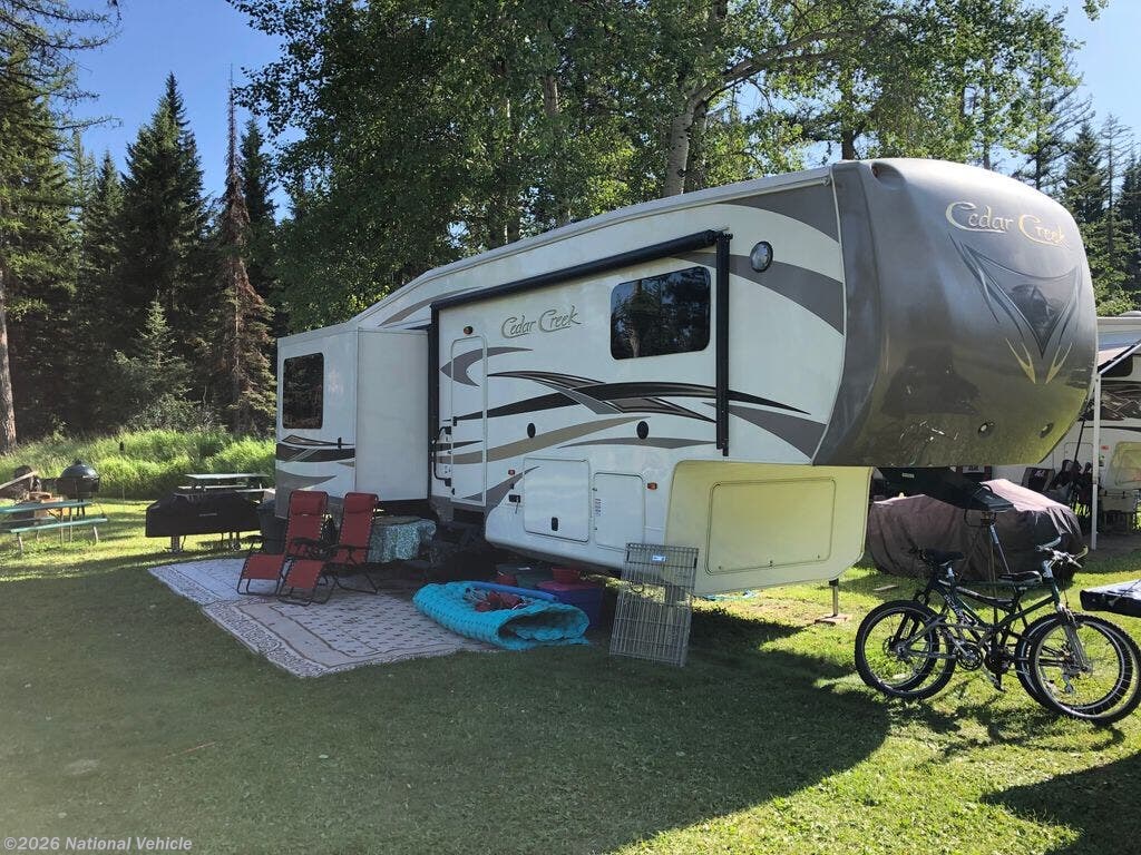 Used 2014 Forest River Cedar Creek 30RL available in Manhattan, Montana