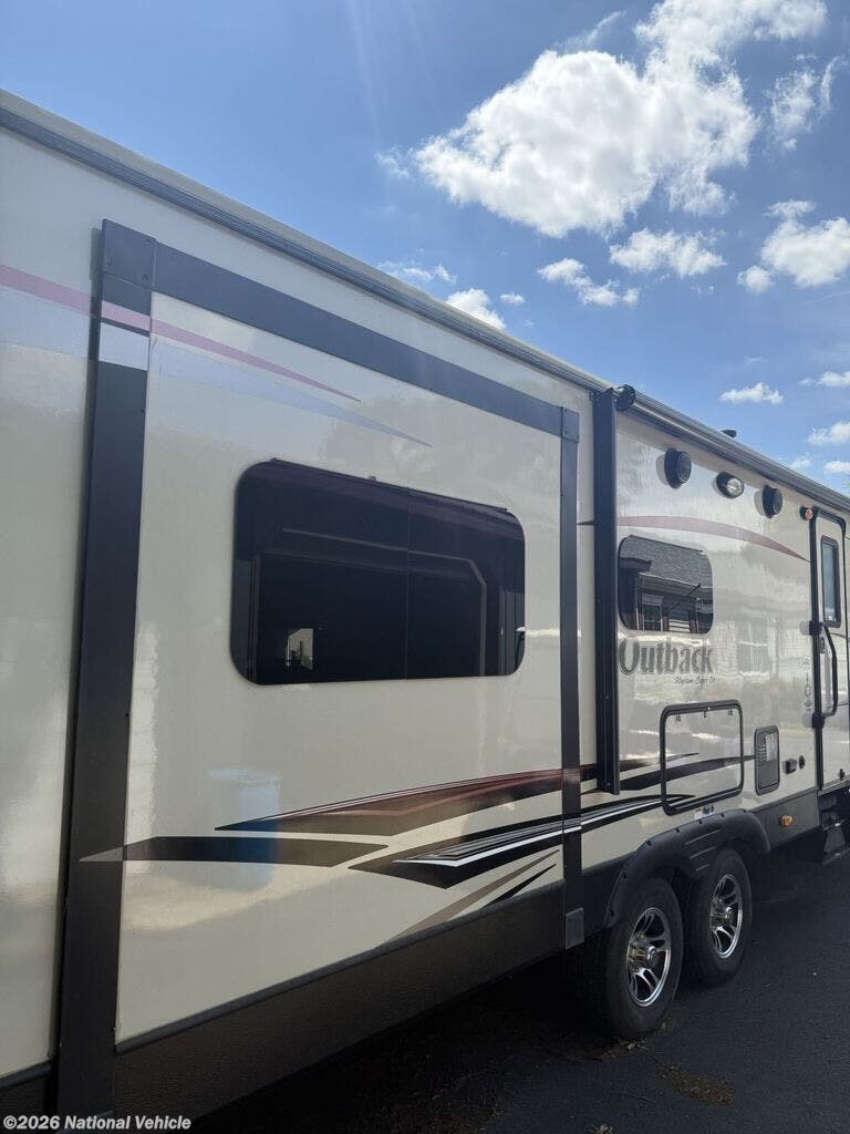Used 2015  Keystone Outback Super-Lite 316RL by Keystone from National Vehicle in Seaford, DE