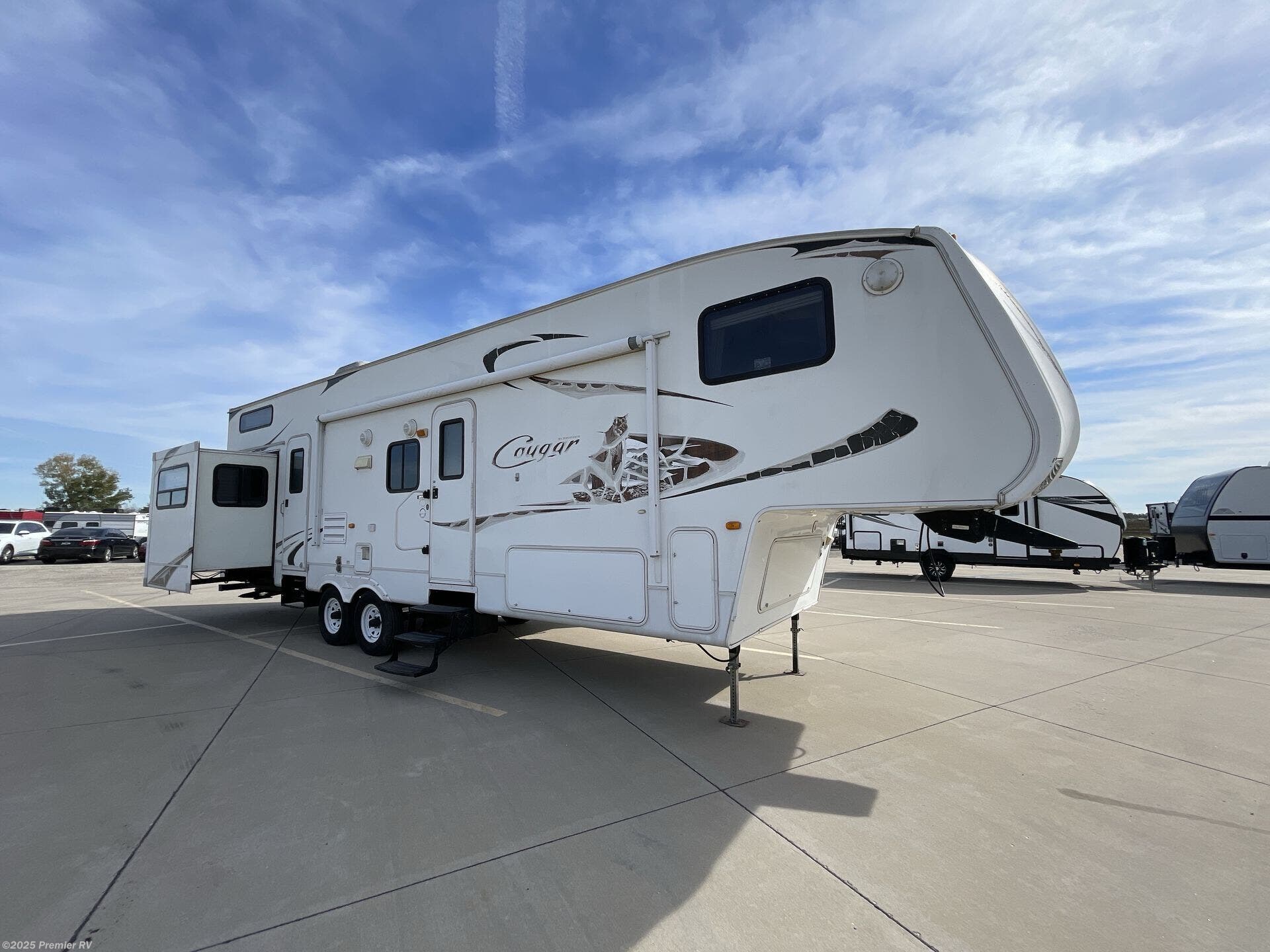 Used 2010 Keystone Cougar 324RLB available in Blue Grass, Iowa