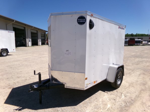 2024 Wells Cargo 5x8 Fast Trac Enclosed Cargo Trailer 2990 GVWR available in Greenville, TX