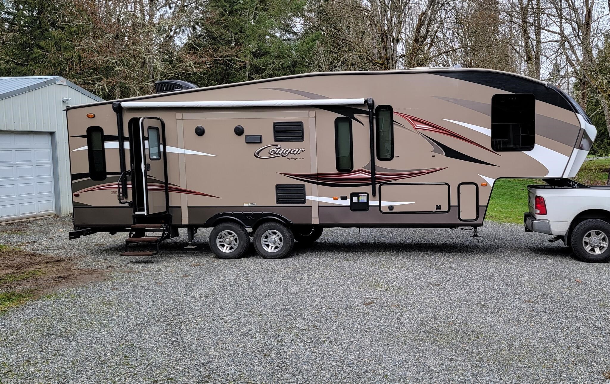 Used 2016 Keystone Cougar Bedroom in front, living in rear available in Roy, Washington