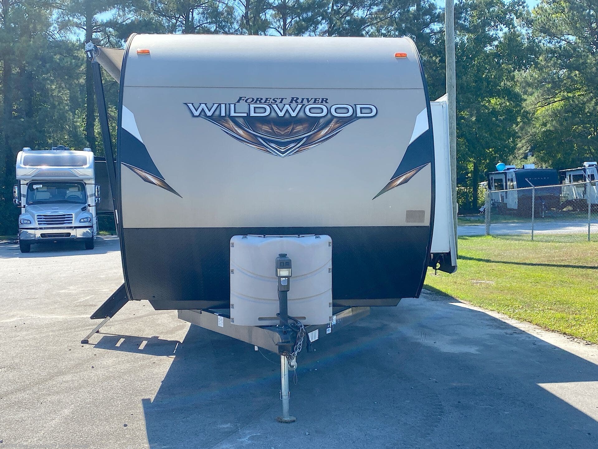 Used 2018  Forest River Wildwood 31KQBTS by Forest River from Blue Compass RV South Raleigh in Benson, NC